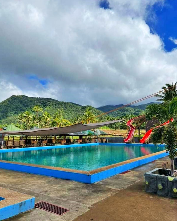 An empty calm pool of Erika's Nature Park.
