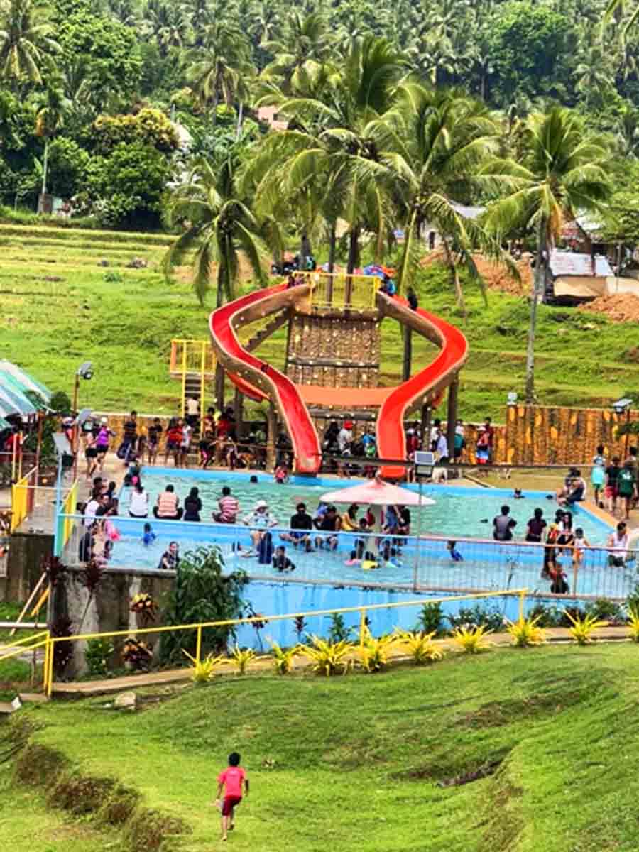 Slides, pools, and the guests enjoying.