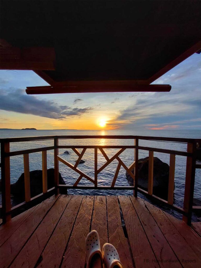 In the balcony watching the sunset.