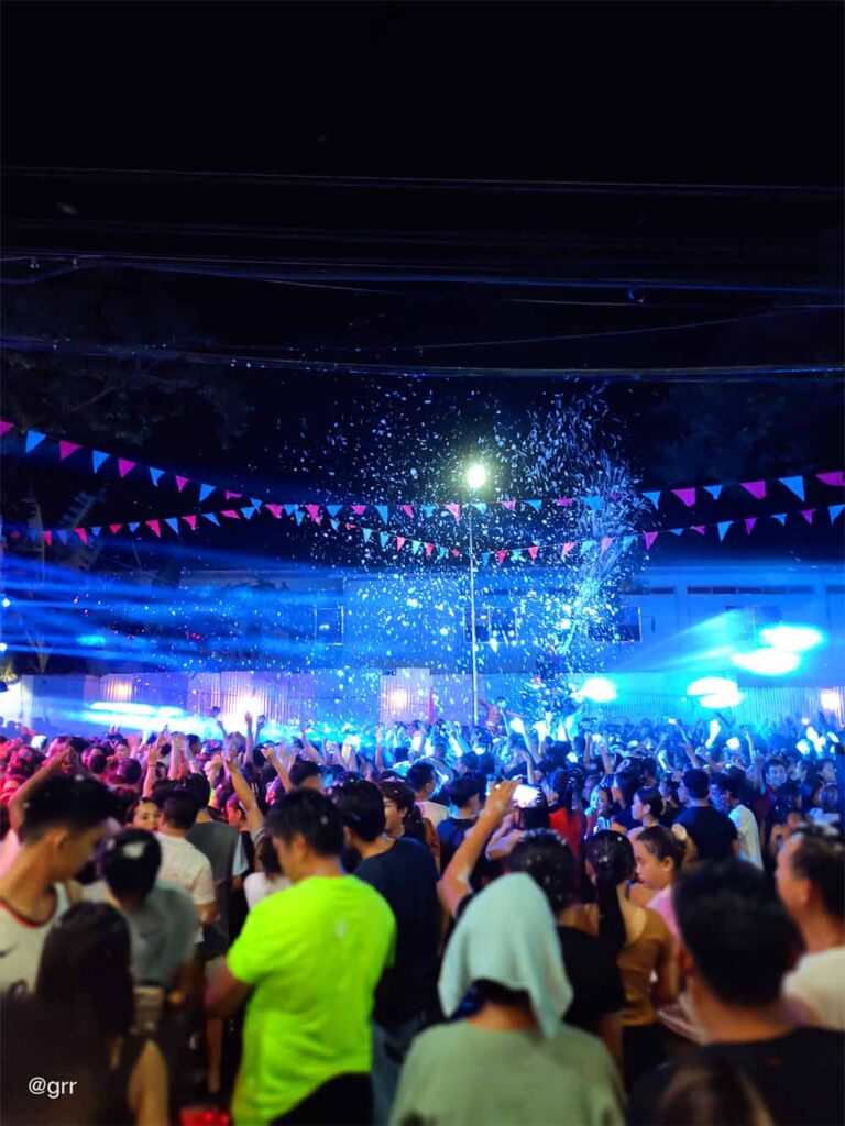 Crowd vibing during the Tsinelas Party.